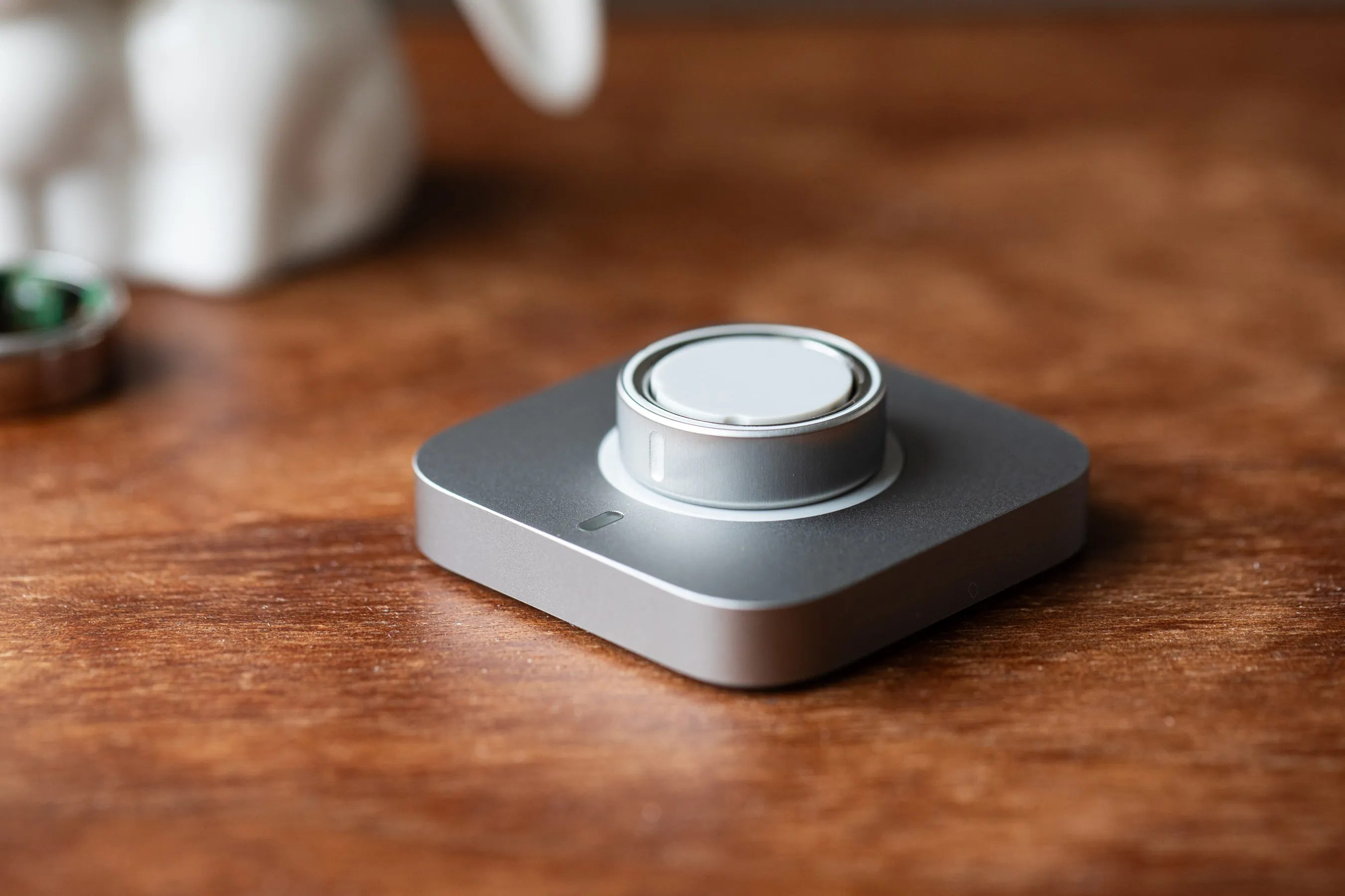 Smart ring resting on its charging dock